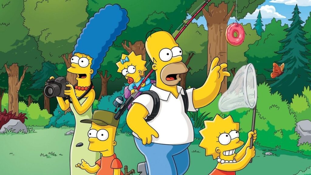 Família simpson se divertindo ao ar livre com Homer, Marge, Bart, Lisa e Maggie em uma imagem colorida e alegre.
